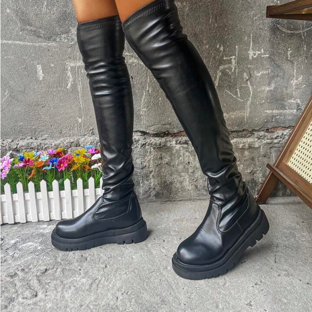 Tall knee high boots